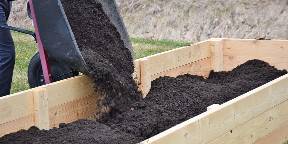 Stephens Landscaping Garden Center - How well do you know your soil- filling up raised garden with soil