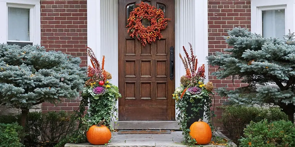 Stephens Landscaping Garden Center-Moultonborough-Front Porch tall planters with pumpkins