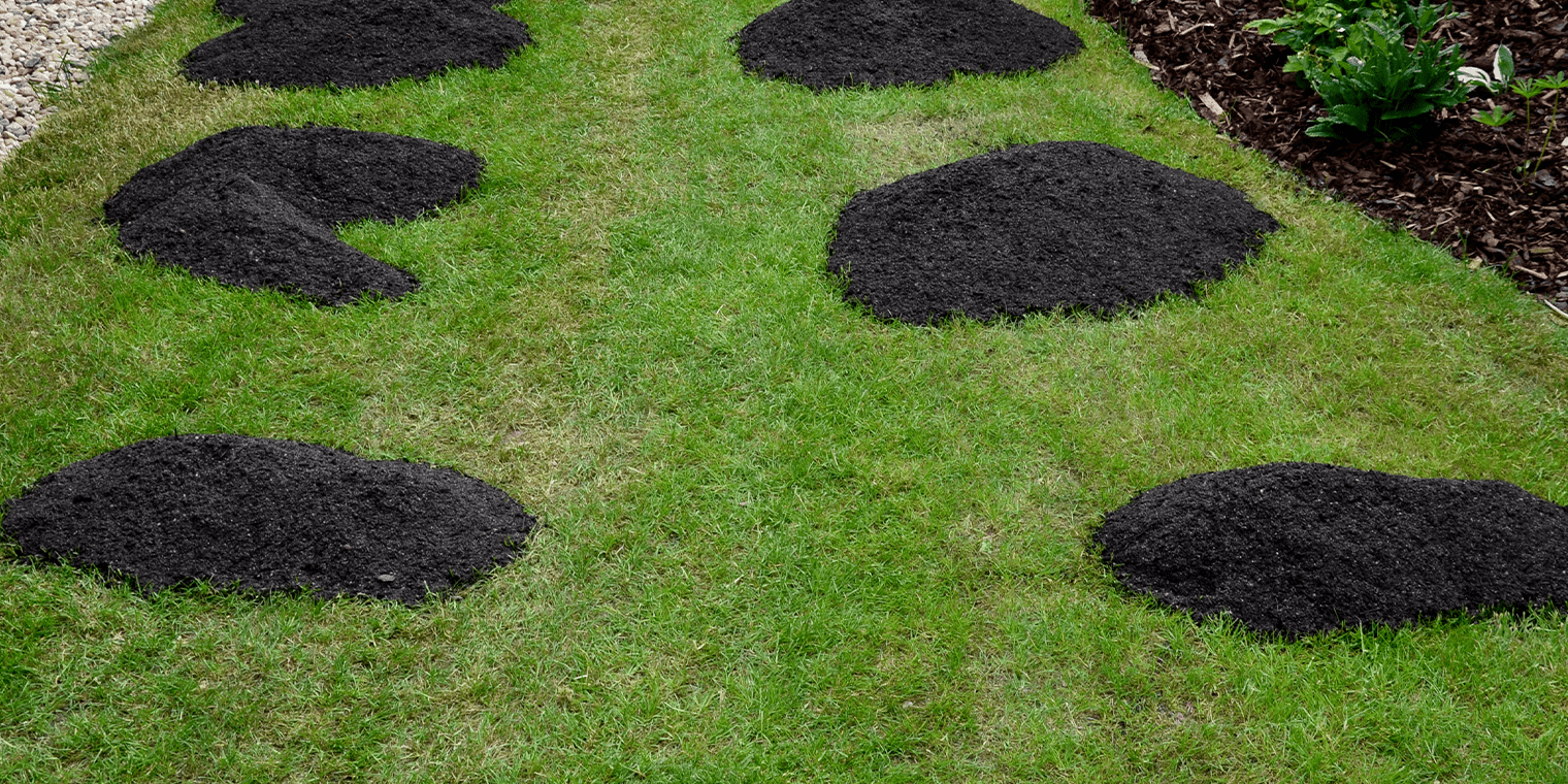 Stephens Landscaping Garden Center -New Hampshire -piles of compost on lawn